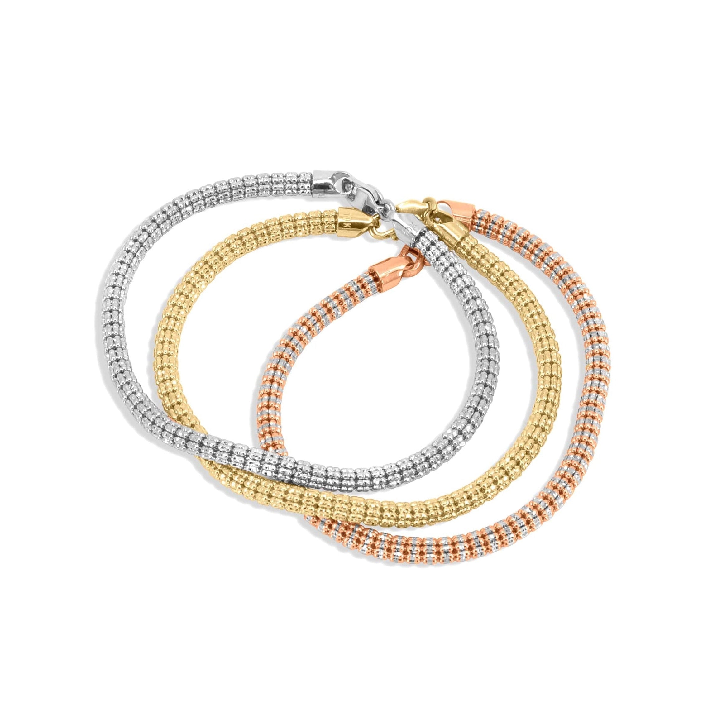 Close-up of 4.5mm 10K gold ice link bracelet at Mayra Jewelry