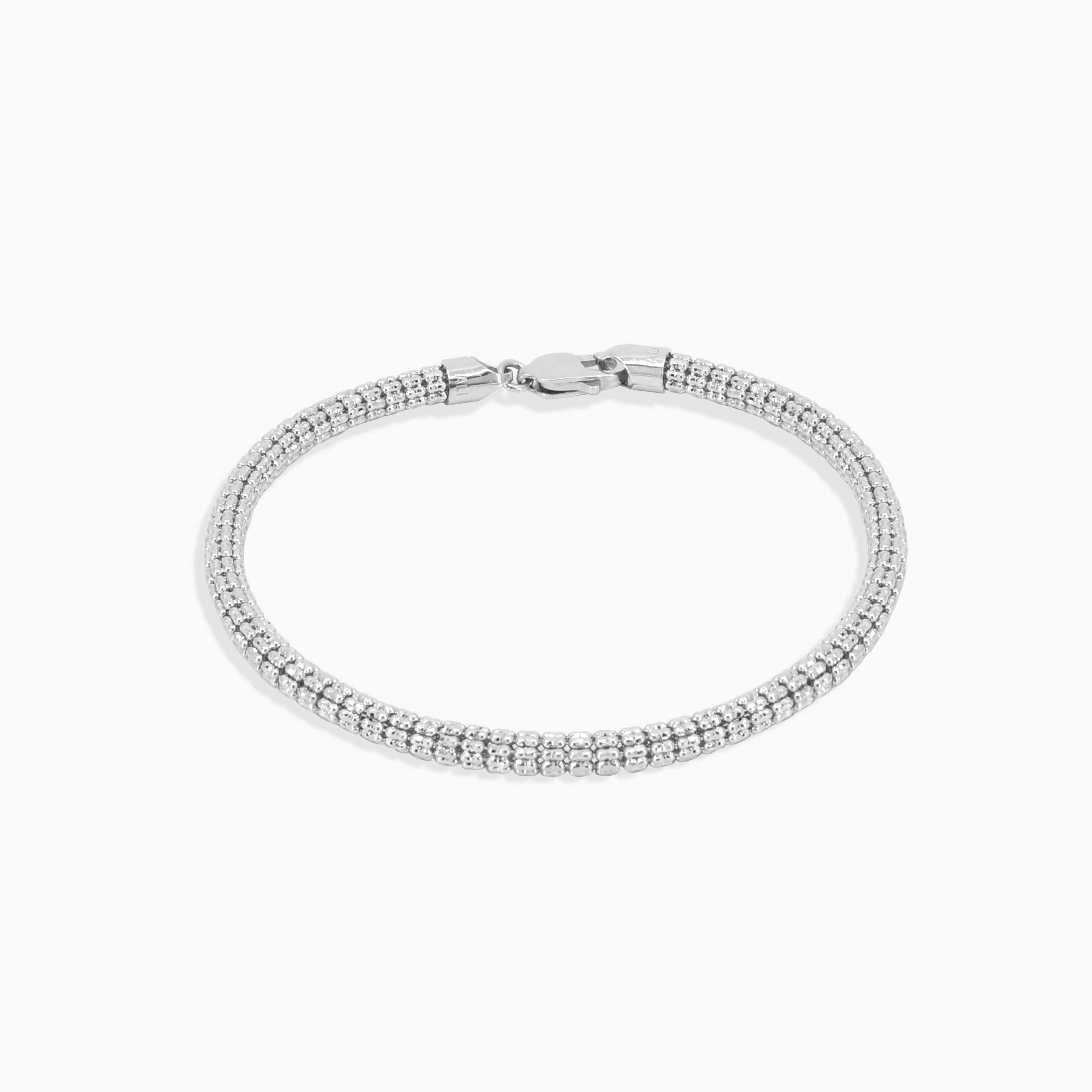 Detail view of 10K gold ice link bracelet at Mayra Jewelry