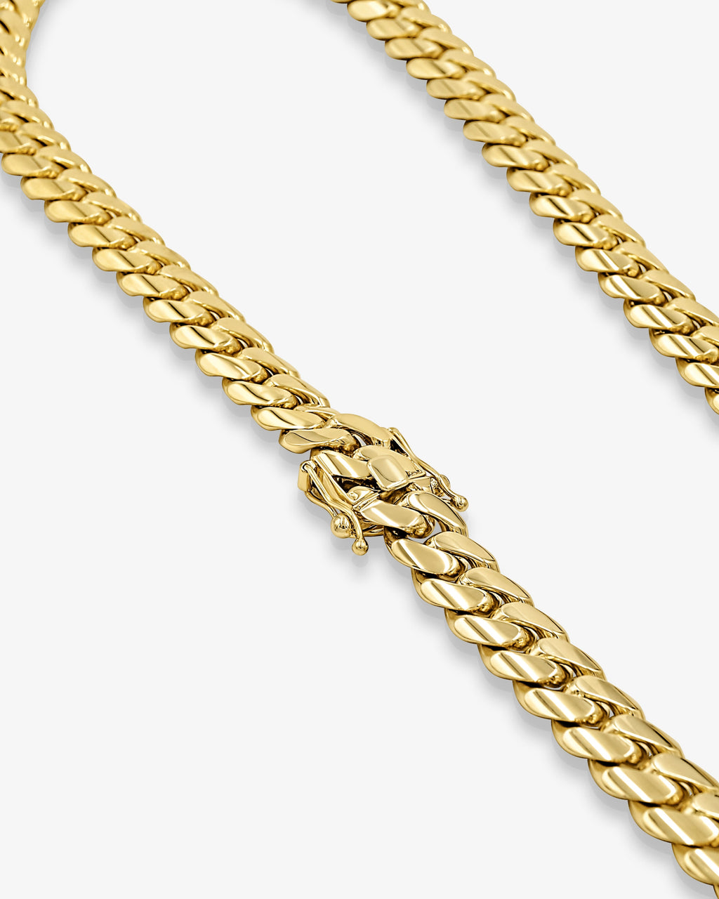 Traditional box clasp on solid gold Cuban link chain at Mayra Jewelry