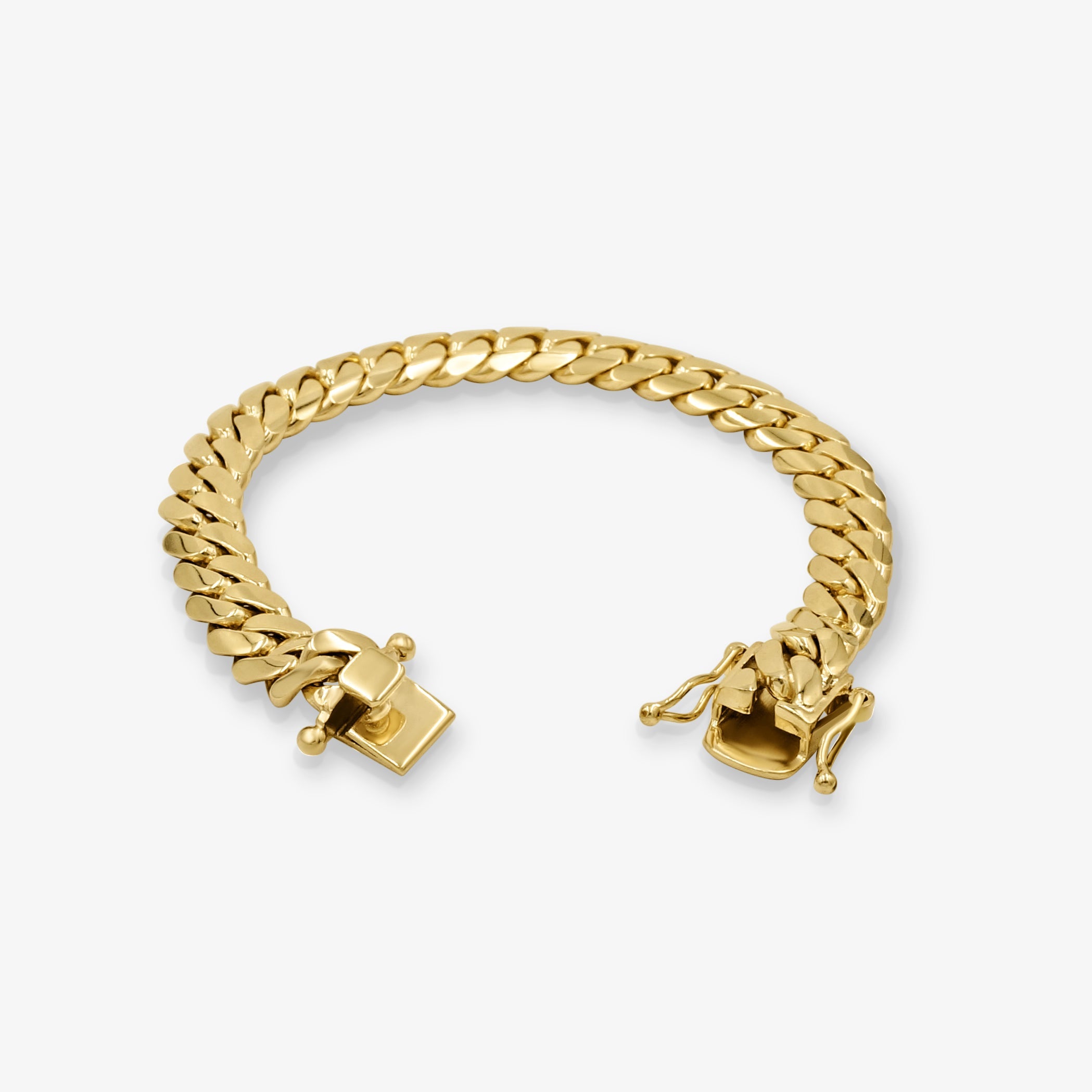 Close-up of 11mm solid gold Cuban link bracelet at Mayra Jewelry