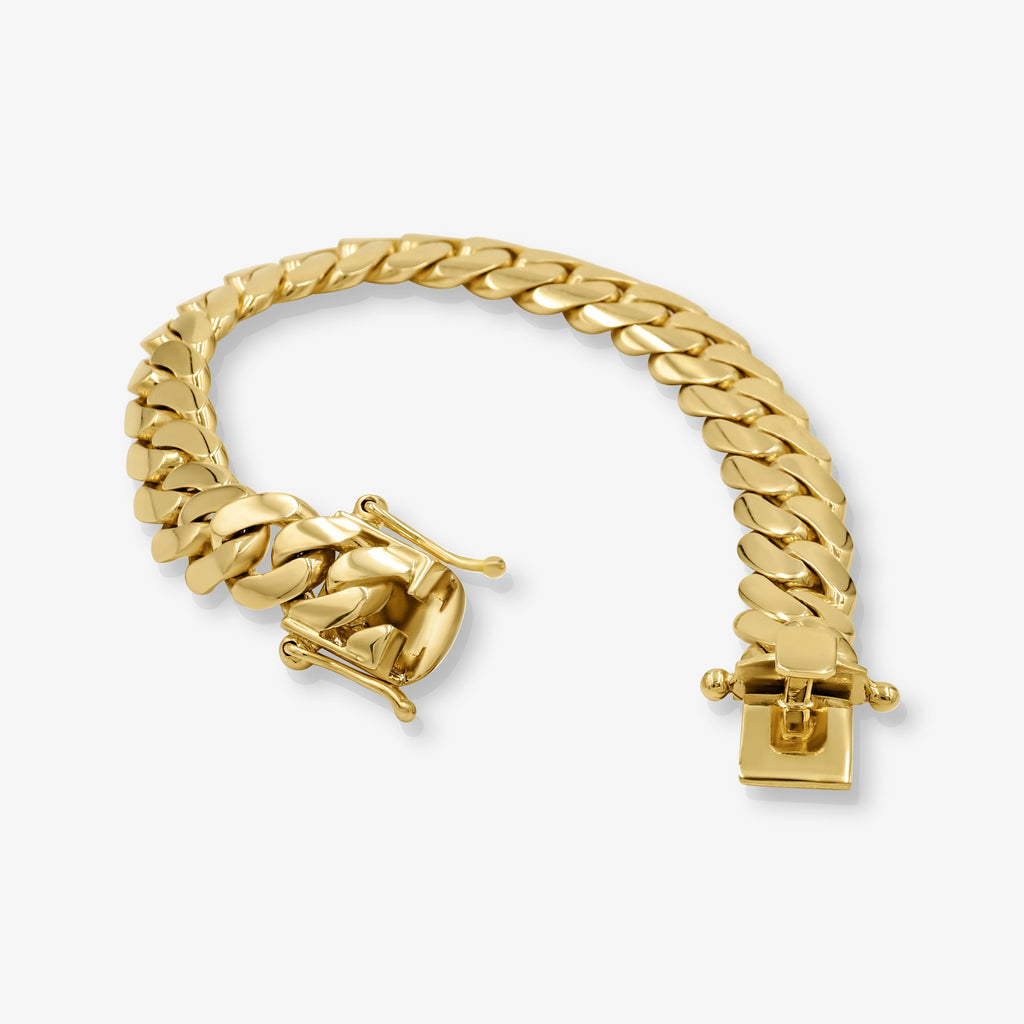 Close-up of 12mm solid gold Cuban link bracelet at Mayra Jewelry
