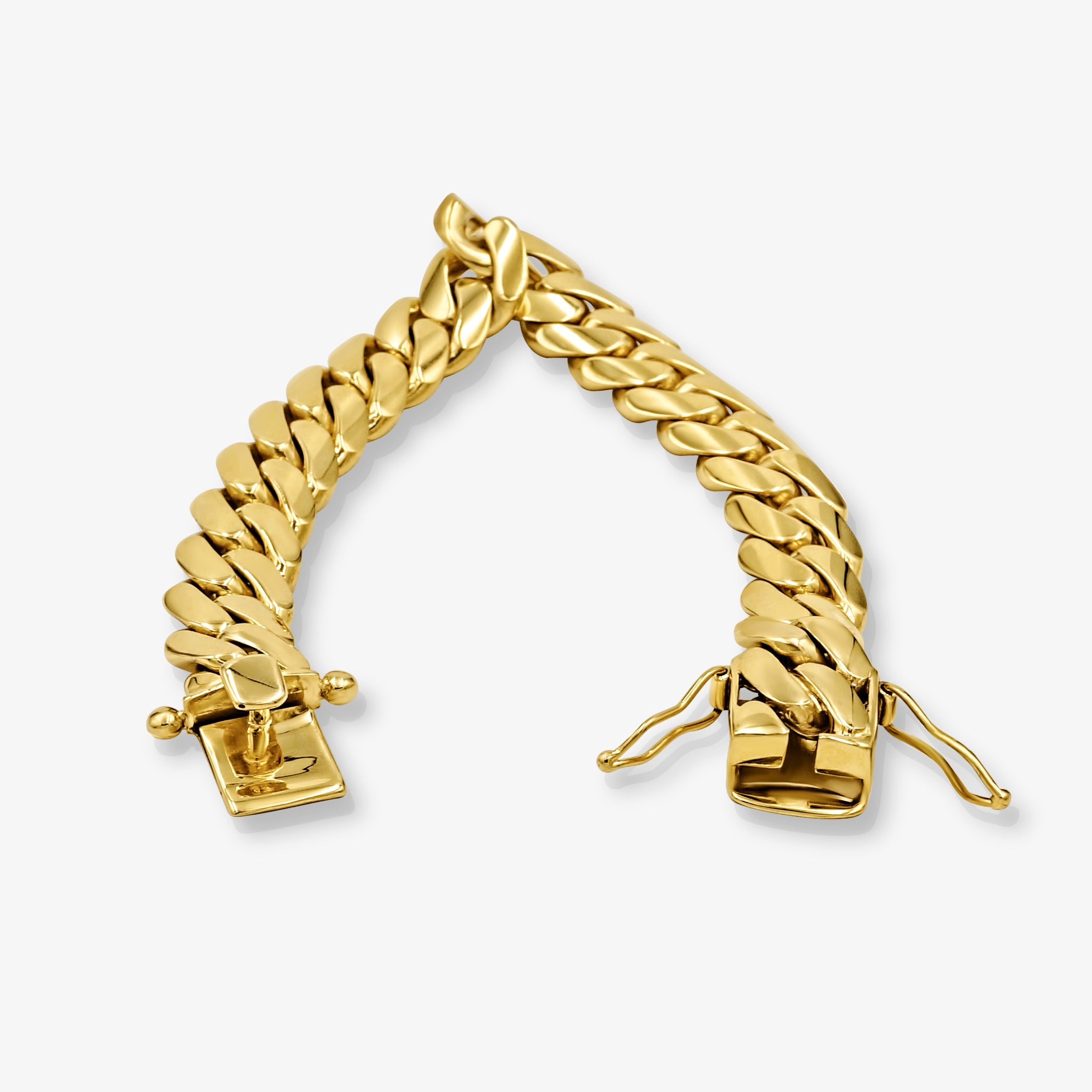 Close-up of 15mm solid gold Cuban link bracelet at Mayra Jewelry