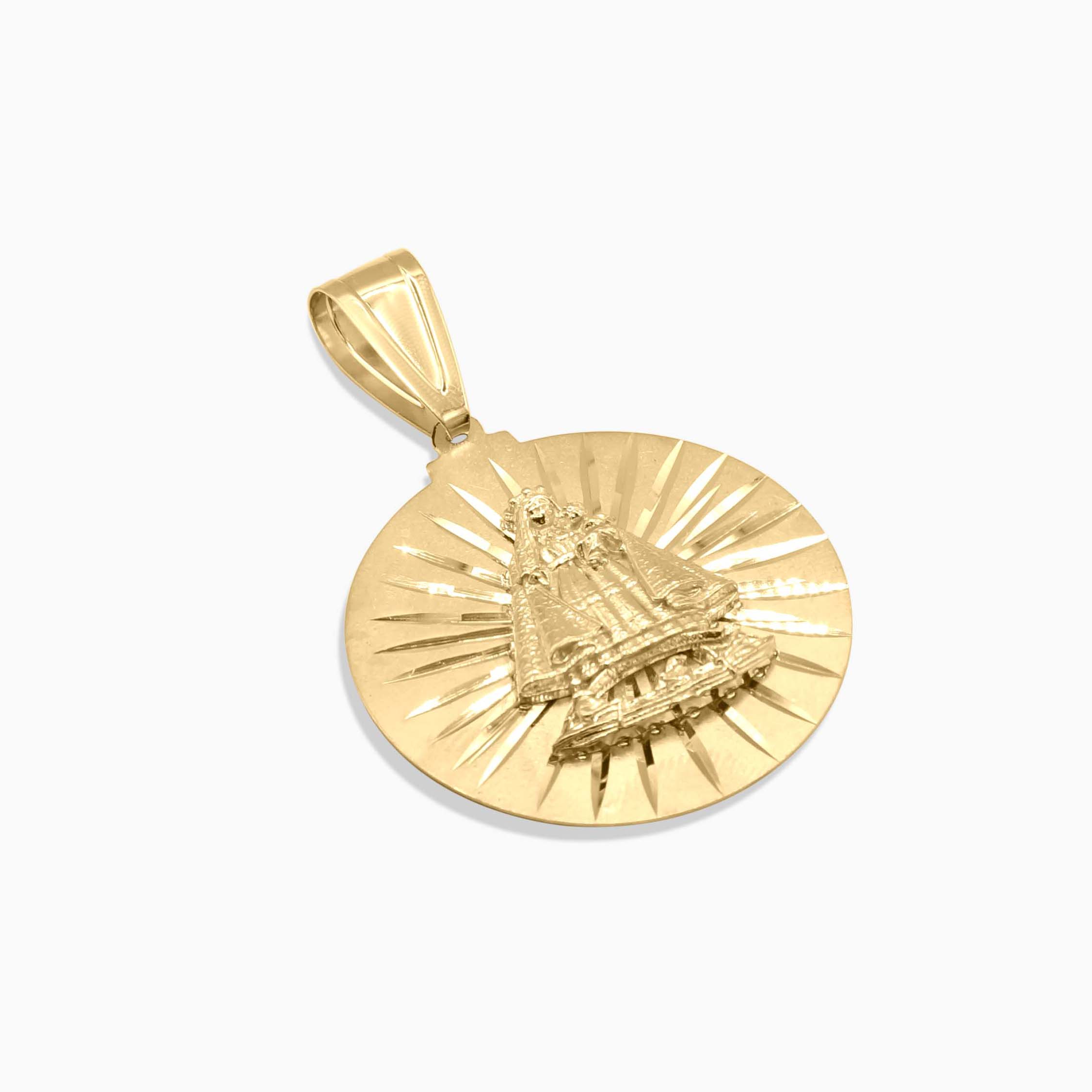 Detail view of round Our Lady of Charity medallion pendant at Mayra Jewelry