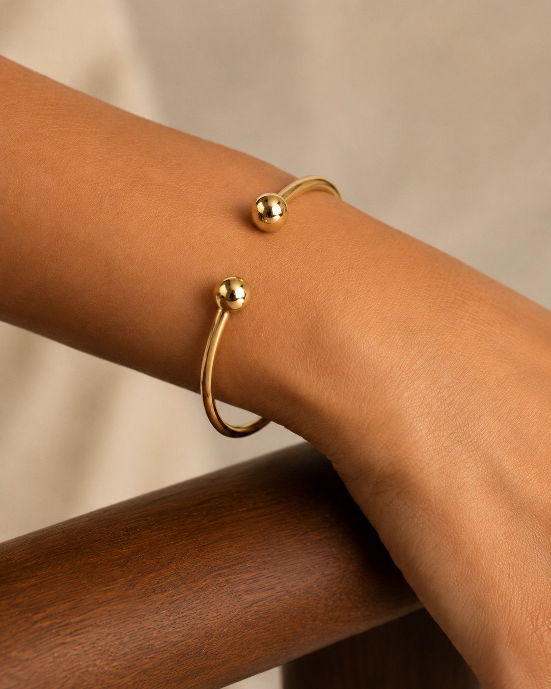Detail view of 10K yellow gold open cuff bracelet at Mayra Jewelry